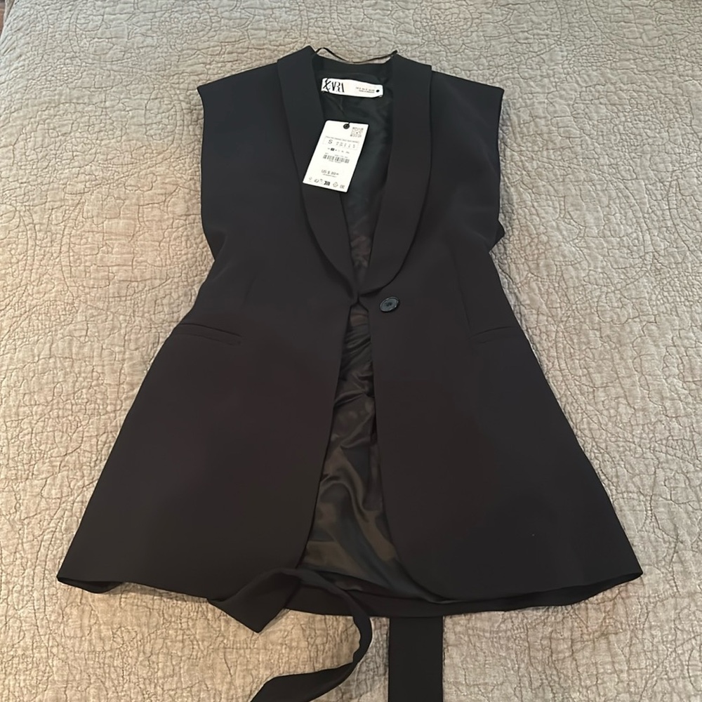 Black belted vest